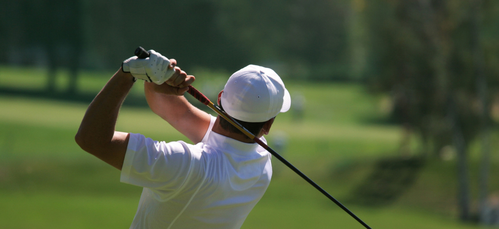 Golf swing follow through Highland Pines Golf Club Spring TX